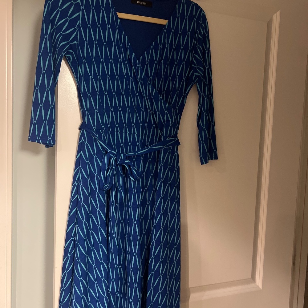 Beautiful blue and turquoise knit faux wrap dress with self belt tie, lined